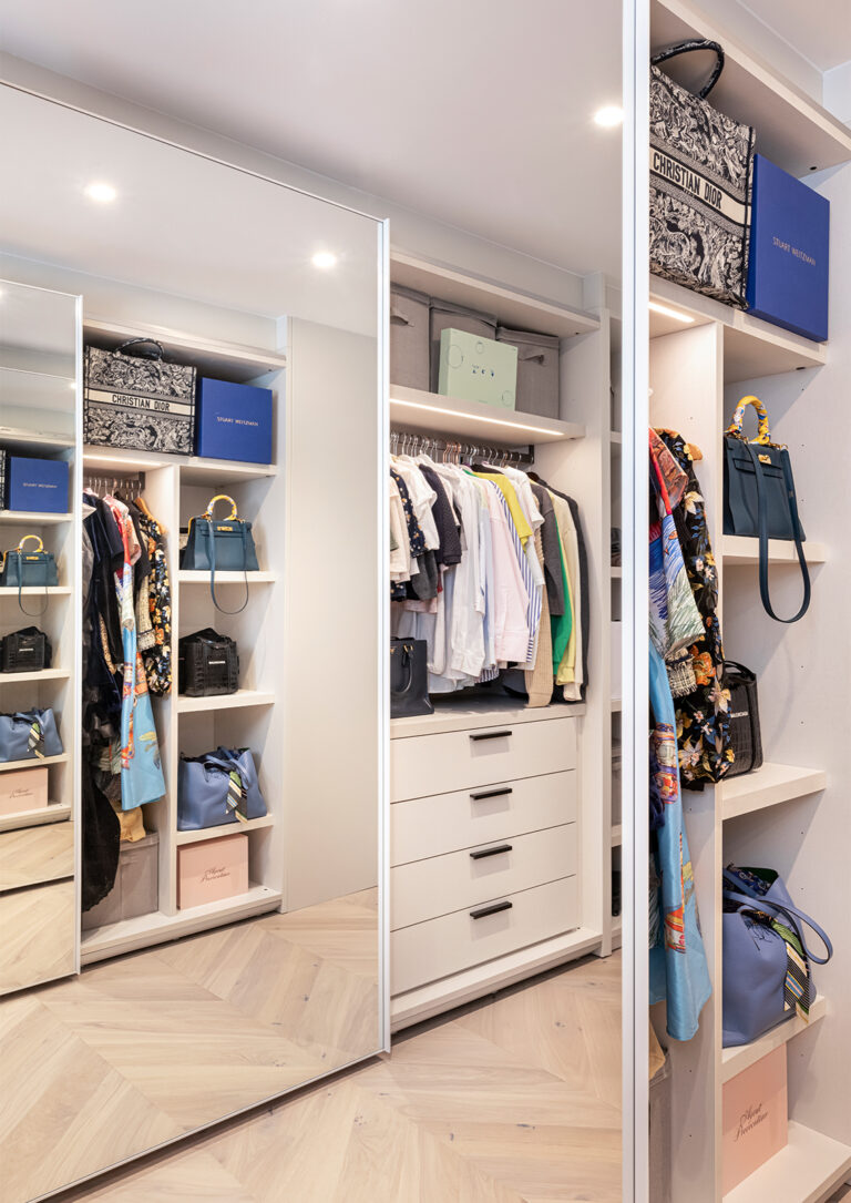 Bespoke luxury walk-in-wardrobe to master bedroom with full height mirror designed by misch_misch studio battersea london